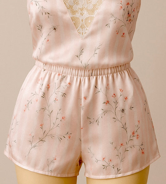 Floral-patterned pajama set on a neutral background