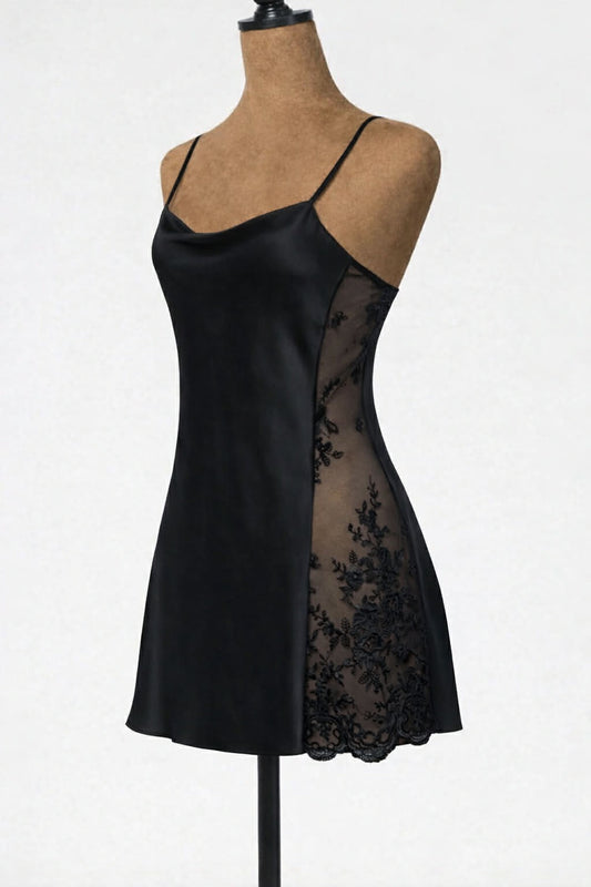 Black satin slip dress with lace details on a mannequin against a white background