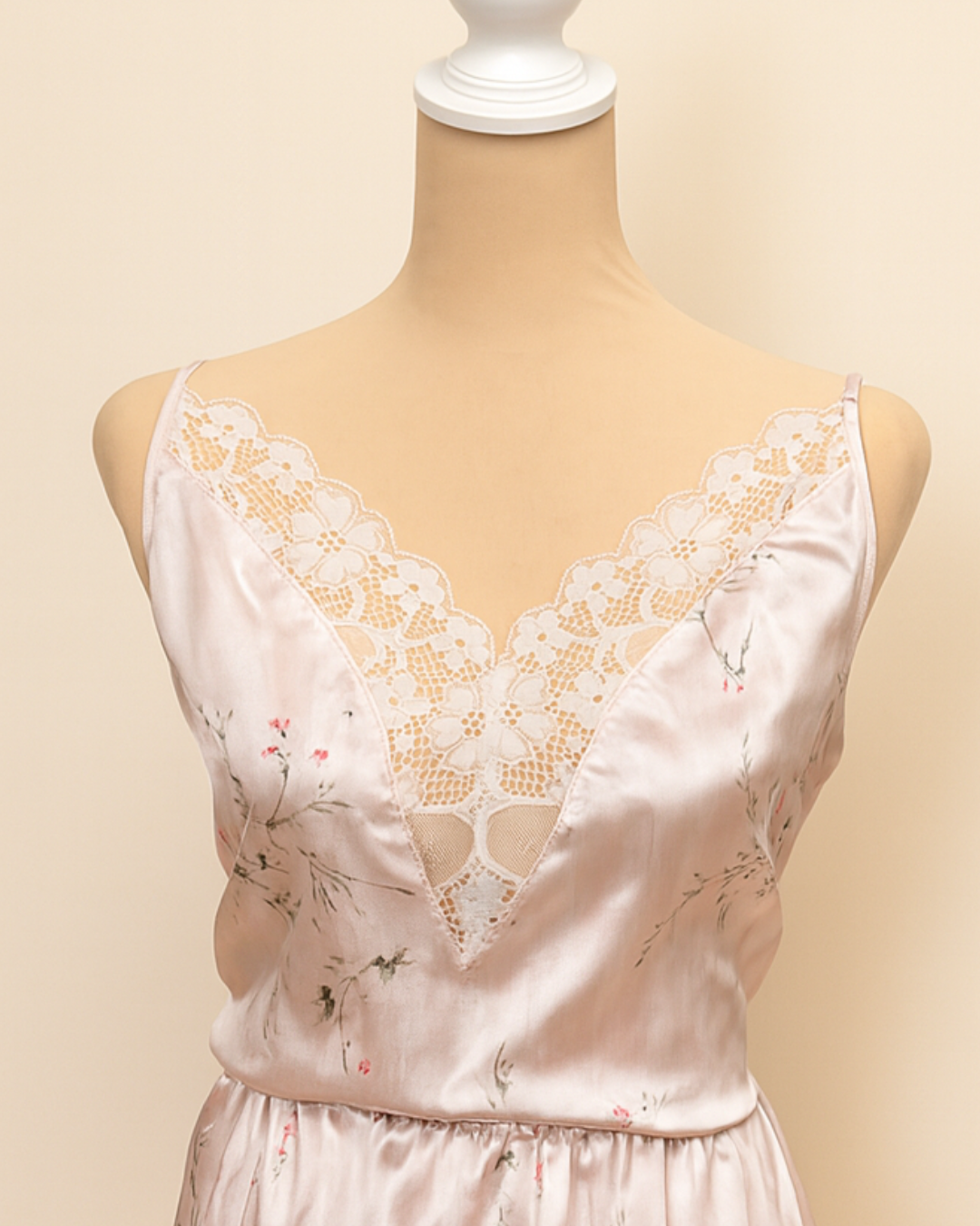 Dainty Lace Modest Lingerie Lace-trimmed satin nightgown on a mannequin against a beige background
